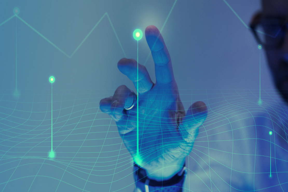A finger touches a network node